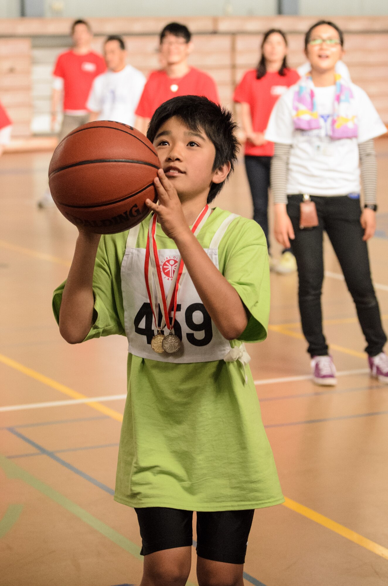 YOKOTA AIR BASE, Japan -- A Special Olympics athlete gets ready to shoot a basket during the Kanto Plains Special Olympics held at Yokota Air Base, Japan, June 1, 2013. Yokota hosted the event for more than 150 athletes from 10 local schools with events ranging from soccer and basket ball to track and field events. (U.S. Air Force photo by Staff Sgt. David Gevert)