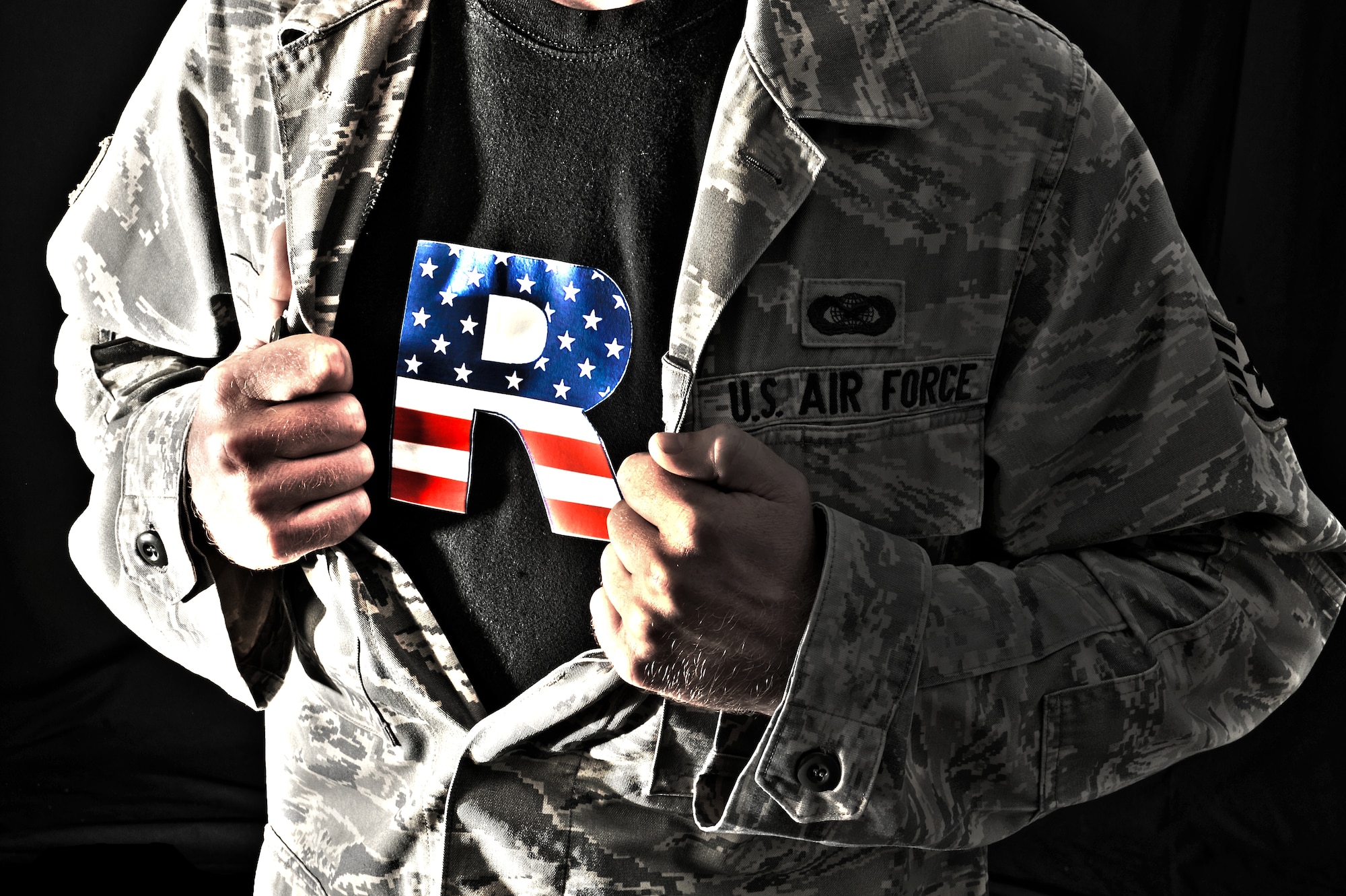After hearing the sound of spine-chilling inflexibility, Resiliency Man begins to shed his day-to-day attire revealing his true colors. Resiliency Man can be found wherever adversity and failure to adapt exists, helping to secure a culture of flexibility and ensuring the Air Force way of life. (U.S. Air Force photo illustration/Senior Airman Lauren Main) 
