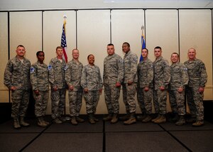 Members of Joint Base Charleston gather for a group photo with Col. Richard McComb, JB Charleston commander, and Chief Master Sgt. Al Hannon, 628th Air Base Wing command chief, after a promotion ceremony May 31, 2013, at JB Charleston – Air Base, S.C. 19 members of JB Charleston were recently promoted. (U.S. Air Force photo/Staff Sgt. Rasheen Douglas)