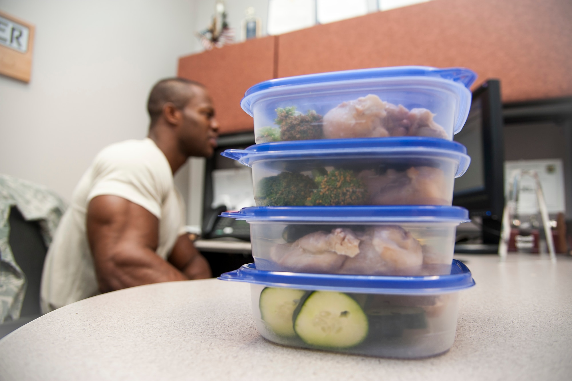 Food sits on the desk of Staff Sgt. Robert Niter II, 47th Medical Operations Squadron NCO in charge of optometry, at Laughlin Air Force Base, Texas, May 29, 2013. Niter eats approximately eight meals a day to keep his metabolism high. (U.S. Air Force photo/Airman 1st Class John D. Partlow)