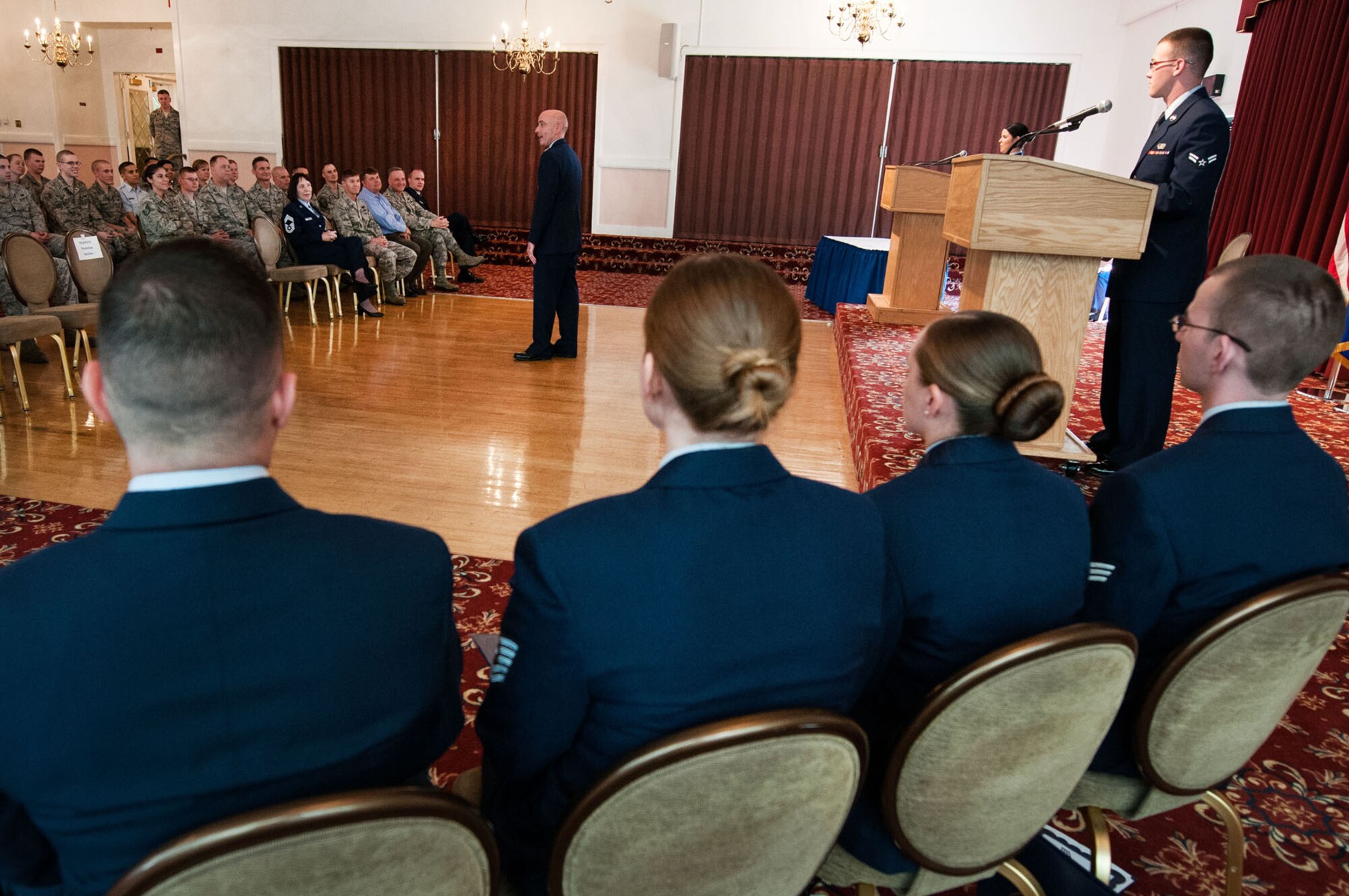 HANSCOM AIR FORCE BASE, Mass. -- Col. Lester A. Weilacher, 66th Air Base Group commander, speaks to members of the base community attending the monthly enlisted promotion ceremony at the Minuteman Commons May 31. Promoted during the ceremony were Master Sgt. Jason Maloney, Tech. Sgt. Nicole Anderson, Staff Sgt. Stephanie Roberts and Senior Airman Thomas Elam. (U.S. Air Force photo by Mark Herlihy)