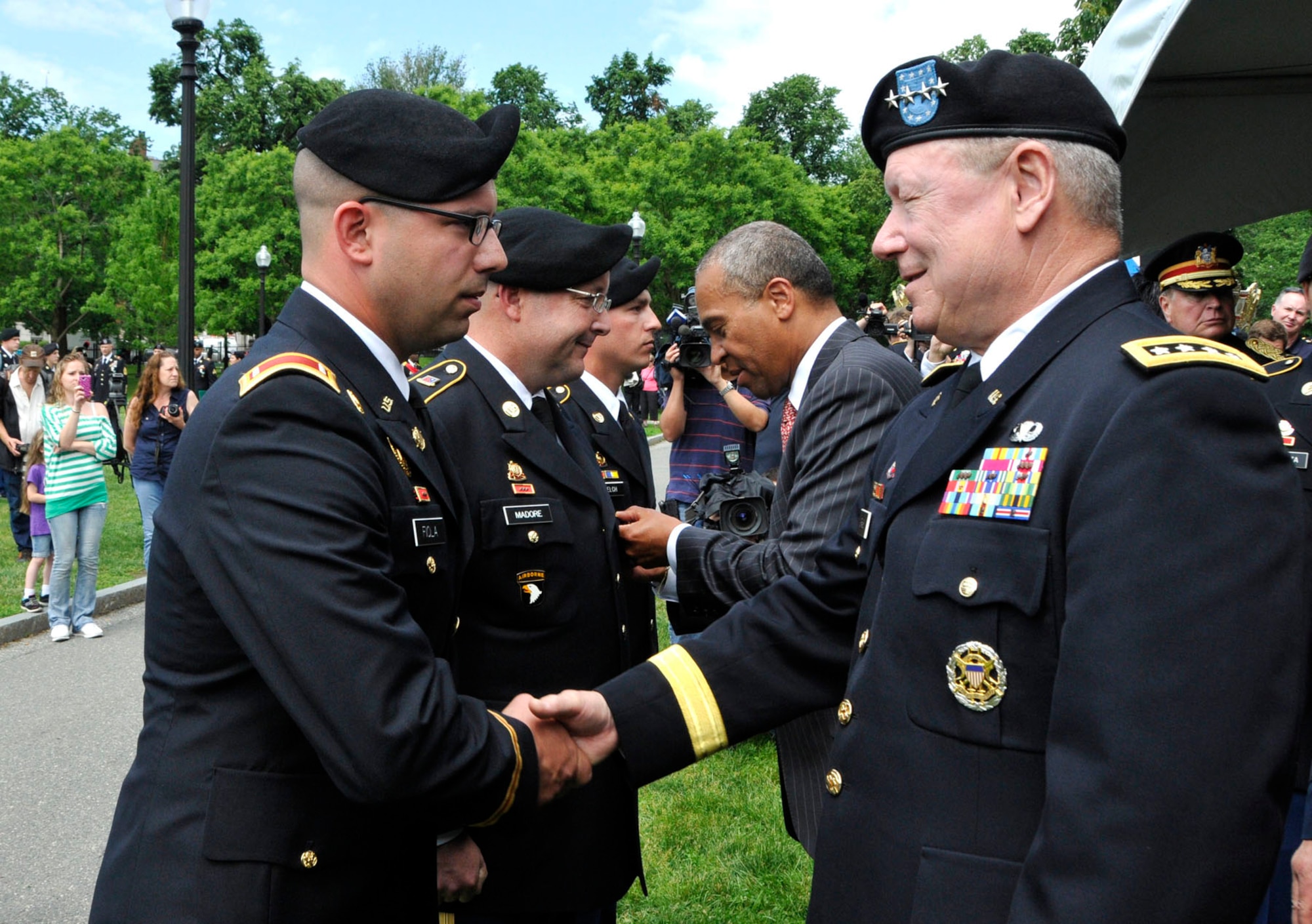 BOSTON – Gen. Frank J. Grass, Chief, National Guard Bureau and member of the Joint Chiefs of Staff thank 1st Lt. Steven D. Fiola, 1060th Transportation Company, for his efforts in response to the Boston Marathon Bombings during a ceremony on Boston Common June 3, 2013. Thirteen Massachusetts National Guardsmen and one New York Guardsman received awards during the ceremony. (U.S. Army National Guard photo by Sgt. 1st Class James C. Lally, Massachusetts National Guard Public Affairs/Released)
