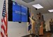 Col Joanie Peterson, Commander of the 131st Medical Group, Missouri Air National Guard, unveils the overall Health Services Inspection results during a commander’s call June 2, 2013 at the Whiteman Air Force Base clinic.  Although the average rating is a Satisfactory, the unit garnered the rare rating of “Outstanding.”  (U.S. Air National Guard photo by Airman 1st Class Nathan Dampf). 


