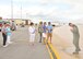 Family of Lt. Col Michael Means, 131st Bomb Wing, Missouri Air National Guard, greet the pilot with a ceremonial dousing with the fire hose at the end of Means' final B-2 flight. Means holds the B-2 flying hours record for the Air National Guard with 1765.8 hours and is second ranking of both active and guard pilots (retired and currently flying). (U.S. Air National Guard Photo by Senior Master Sgt. Mary-Dale Amison/RELEASED)