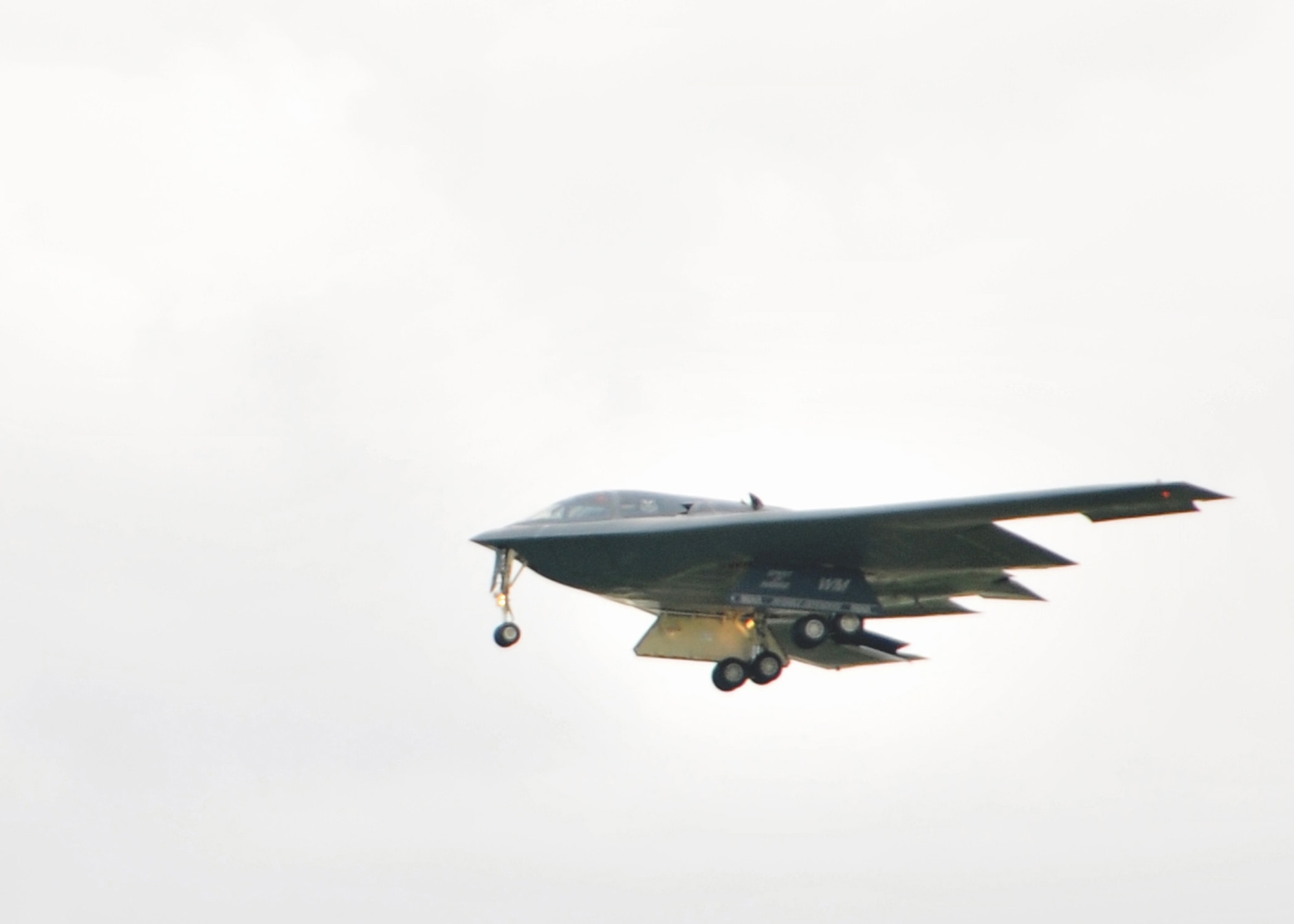 The B-2 "Spirit of Hawaii" prepares to land.  Onboard, pilot Lt.Col Michael Means, 131st Bomb Wing, Missouri Air National Guard, on his final flight before his retirement.  Means holds the B-2 flying hours record for the Air National Guard with 1765.8 hours and is second ranking of both active and guard pilots (retired and currently flying). (U.S. Air National Guard Photo by Senior Master Sgt. Mary-Dale Amison/RELEASED)
