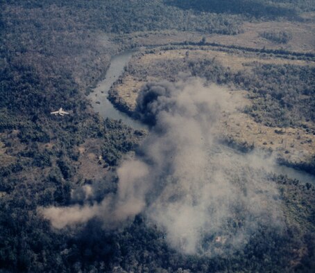 An F-100 finishes its attack on an enemy target. Depending on the type of target, F-100s could deliver a deadly mixture of conventional bombs, cluster bombs, rockets and napalm. They could also strafe enemy forces with their four devastating 20mm cannon. (U.S. Air Force photo)