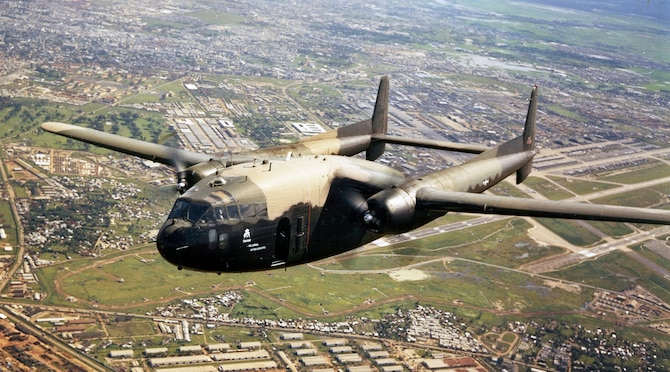 Gunships provided crucial close air support for nighttime defense of hamlets, outposts, and military bases. This daytime photograph shows an AC-119G from the 17th Special Operations Squadron from Nha Trang Air Base over Tan Son Nhut Air Base in 1969. (U.S. Air Force photo)