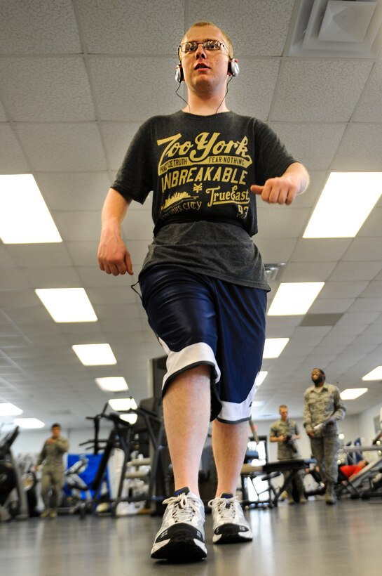 U.S Air Force Airman 1st Class Aaron Mosher, an aerospace ground equipment mechanic for 1st Special Operations Equipment Squadron, goes through a workout during physical training on Hurlburt Field, Fla., May 29, 2013. Many of the patients seen are post-surgery patients, attending physical therapy for about six months. (U.S. Air Force photo/Airman 1st Class Christopher Callaway) 