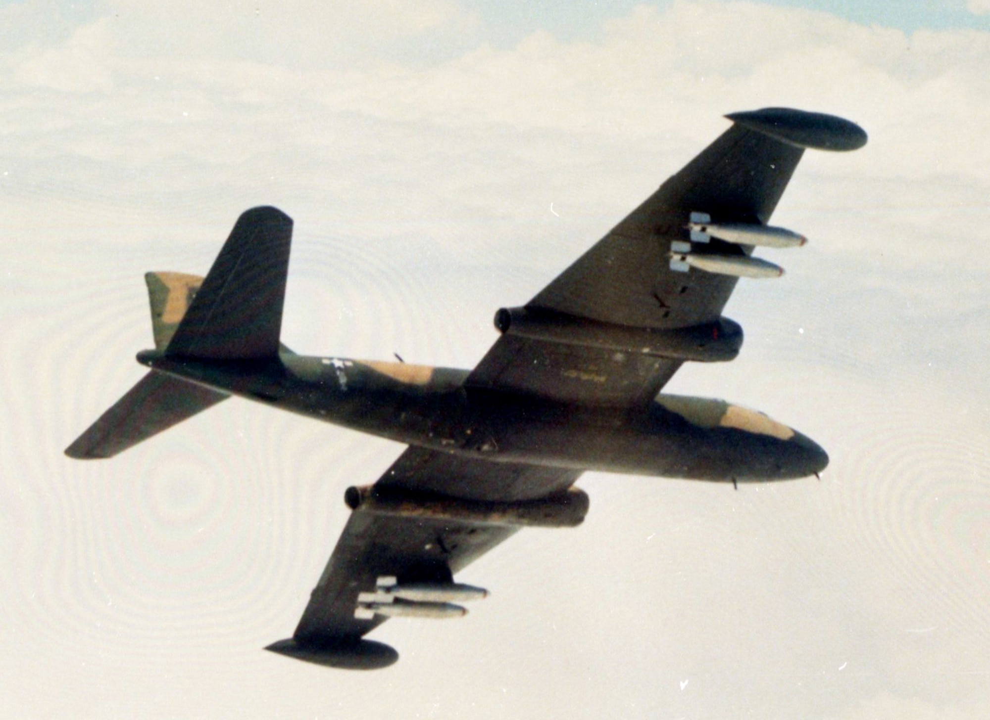 A B-57 of the 8th Tactical Bomb Squadron loaded with two 750-pound napalm canisters on each wing in 1969. In addition to carrying a larger bomb load, the jet-powered B-57s provided quicker response time to requests for close air support when a delay of just a few minutes could mean disaster for the ground forces. (U.S. Air Force photo)