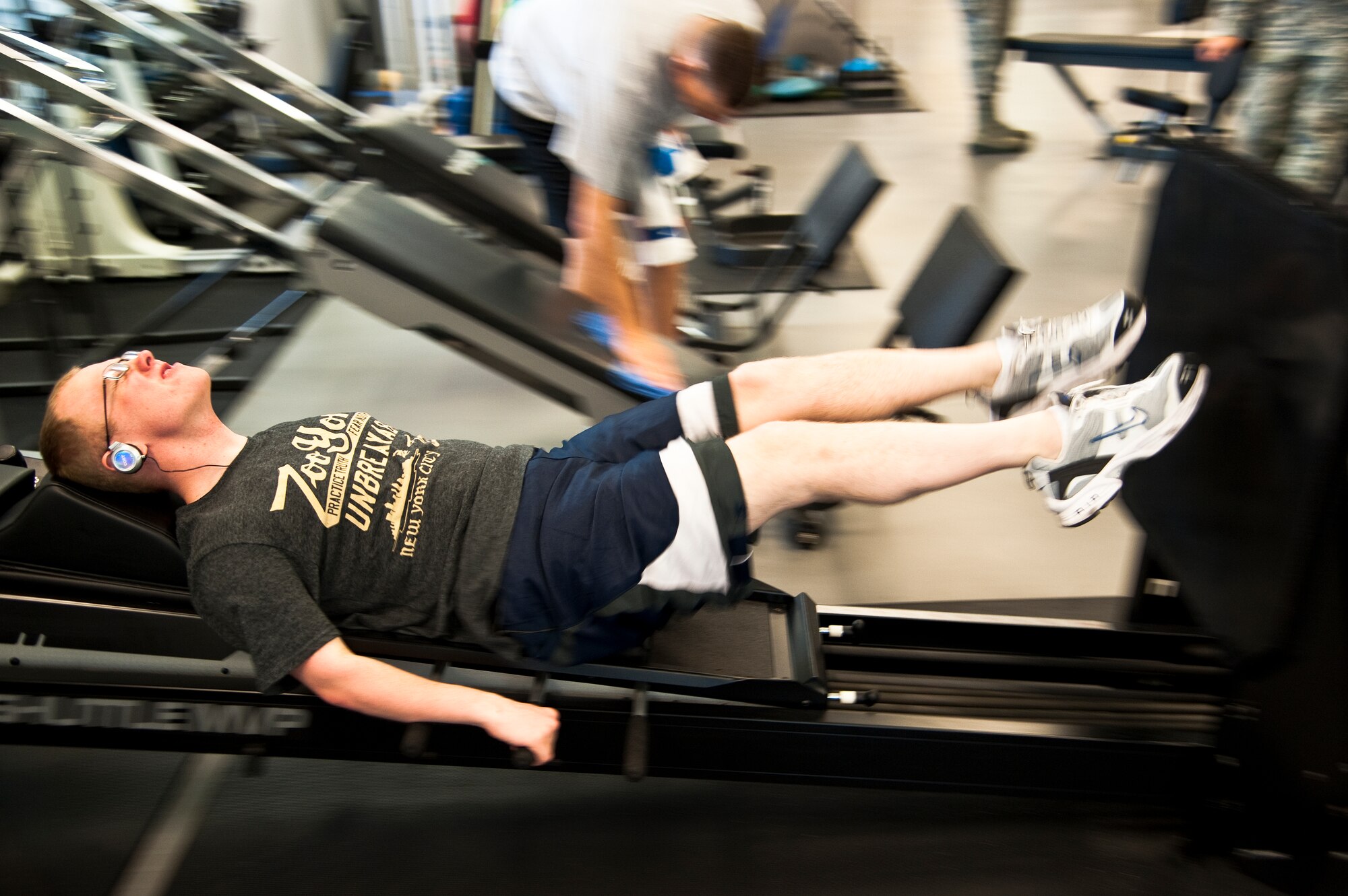 U.S Air Force Airman 1st Class Aaron Mosher, an aerospace ground equipment mechanic for 1st Special Operations Equipment Squadron, goes through a workout during physical training on Hurlburt Field, Fla., May 29, 2013. Physical training technicians are primarily concerned with the remediation of injuries and disabilities as well as the promotion of mobility, functional ability, quality of life and movement potential through examination, evaluation, diagnosis and physical intervention. (U.S. Air Force photo/Airman 1st Class Jeffrey Parkinson) 