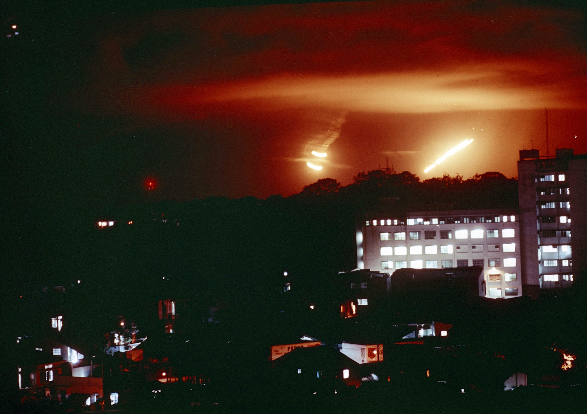 Time-lapse photograph of parachute flares dropped by a flareship just outside of Saigon. With this illumination, strike aircraft could provide close air support even at night. (U.S. Air Force photo)