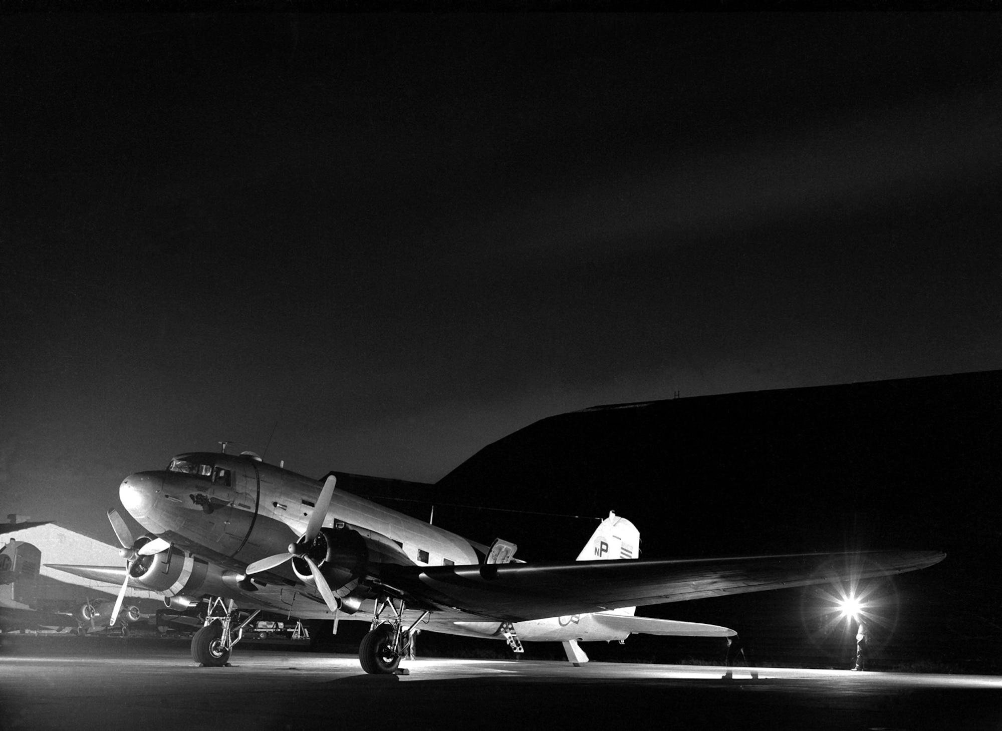 A South Vietnamese Air Force (VNAF) C-47 Skytrain of the 33rd Tactical Wing at Tan Son Nhut Air Base before a night flare drop mission in January 1967. Members of the 33rd worked with U.S. Air Force advisors to provide flare illumination for allied ground security forces and Air Force close air support operations. (U.S. Air Force photo)