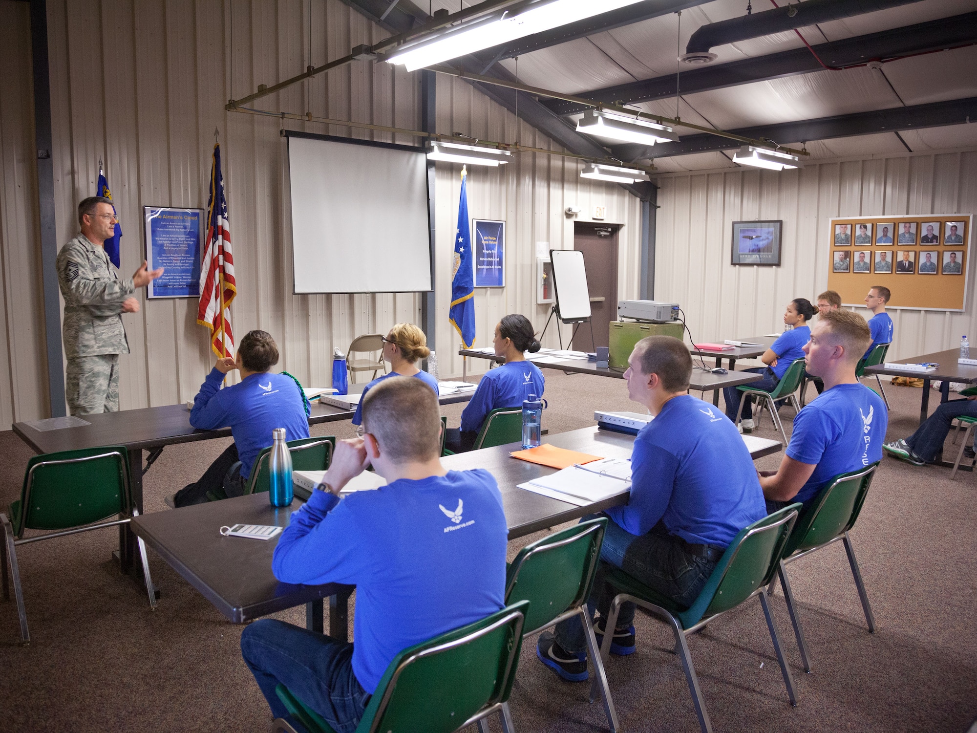Command Chief Mark Koenig, 934th Airlift Wing command chief, speaks to a group of Development and Training Flight trainees during the June Unit Training Assembly weekend at the Minneapolis-St. Paul Air Reserve Station, Minn.  (U.S. Air Force photo/Shannon McKay)