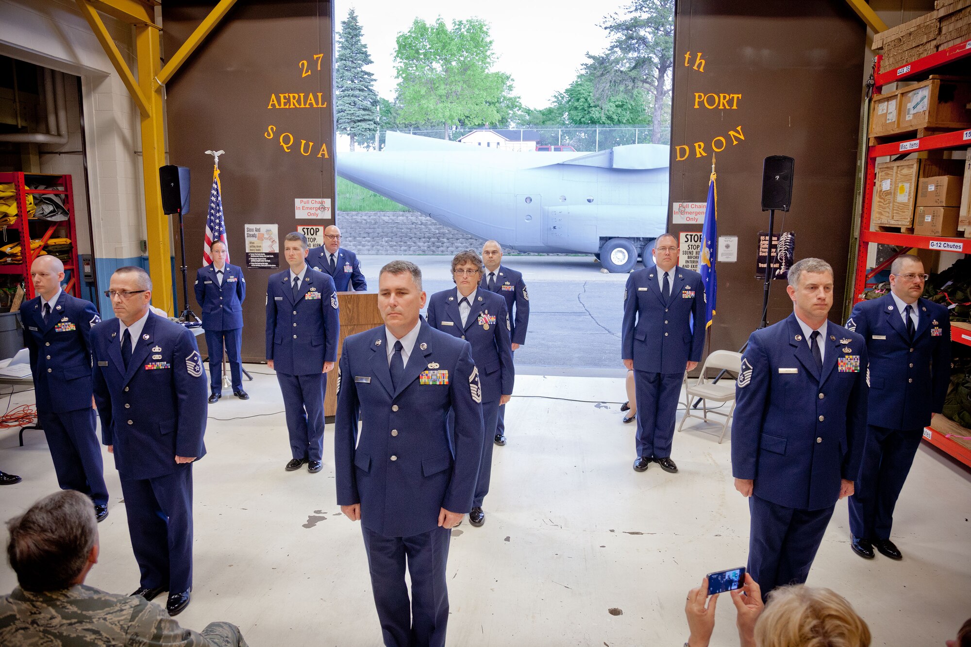 Senior Master Sgt. Kelly Kay, First Sergeant, 27th Aerial Port Squadron, stands in the center of a first sergeant diamond formation during her retirement ceremony.  Sergeant Kay retires after 33 years of service at the Minneapolis-St. Paul Air Reserve Station, Minn.  (U.S. Air Force photo/Shannon McKay)