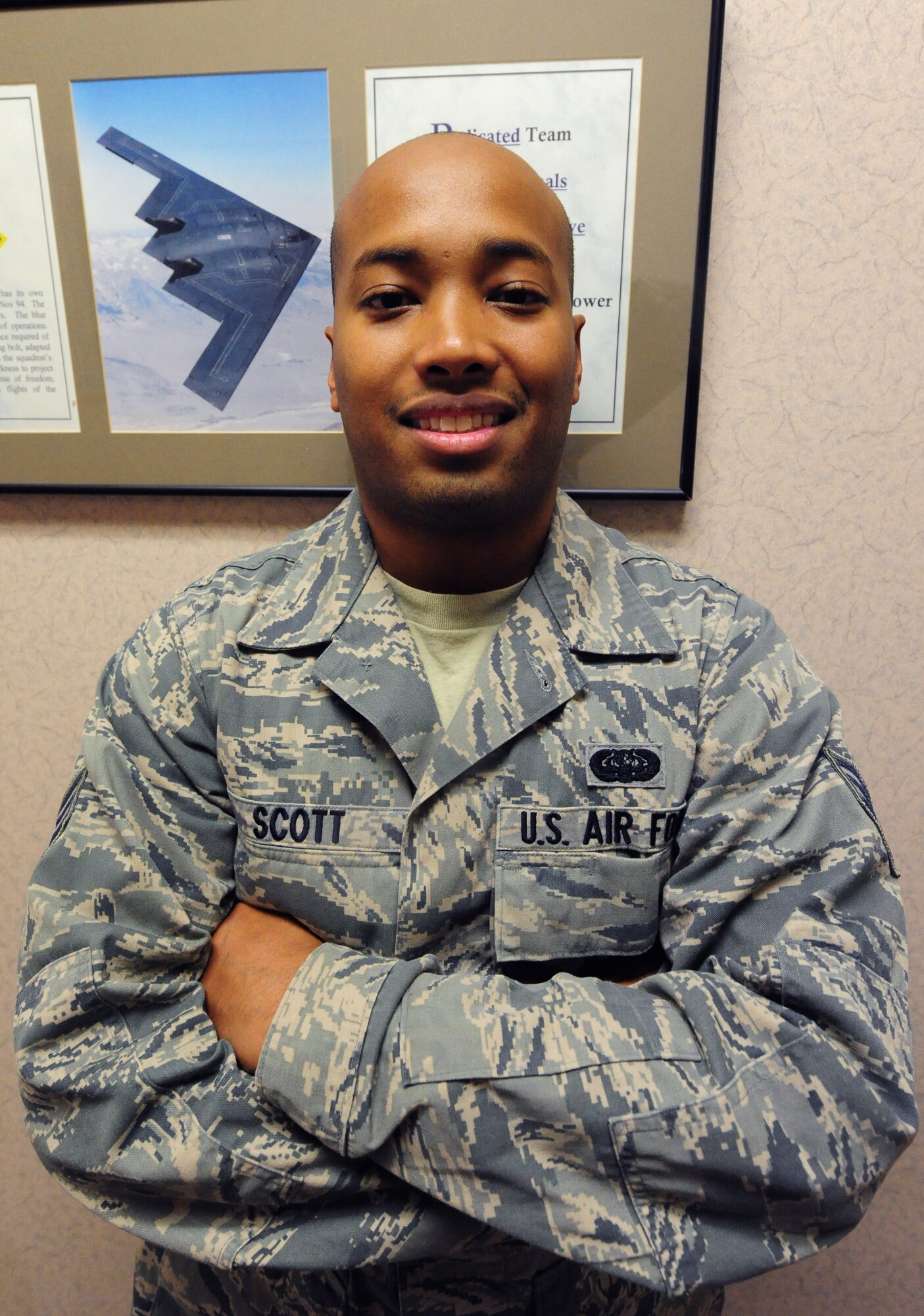 Senior Airman Kenneth Scott, 509th Operations Support Squadron combat crew communications technician, was deployed to Anderson Air Force Base, Guam and Nellis Air Force Base, Nev., from January to March 2013. His career field supports B-2 Spirit flight operations by providing radios that allow pilots to communicate with whoever they need to in a moment's notice. (U.S. Air Force photo by Staff Sgt. Nick Wilson/Released)