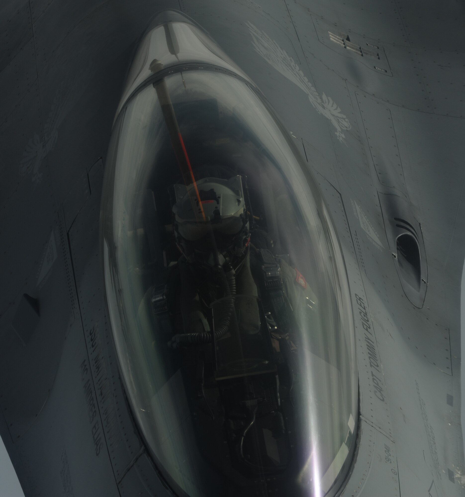 An F-16 Fighting Falcon pilot waits to receive fuel during training over the Pacific, May 29, 2013. Refueling training missions, such as these, are conducted to maintain operational readiness in support of the 18th Wing and its mission. (U.S. Air Force photo by Airman 1st Class Keith A. James/Released)
