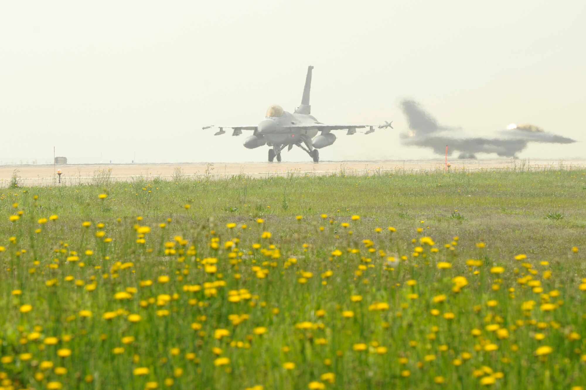 KUNSAN AIR BASE, Republic of Korea – A Republic of Korea air force KF-16, from the 20th Fighter Wing, 120th Fighter Squadron, Seosan Air Base, ROK, takes off during a Buddy Wing Exchange at Kunsan AB, ROK, May 23, 2013. The last time pilots from Seosan AB flew with Kunsan Airmen was two years ago. (U.S. Air Force photo by Staff Sgt. Tong Duong/ Released) 