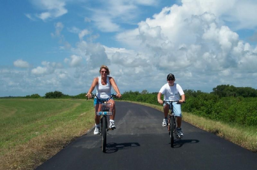 Bicycle enthusiasts get some exercise on the Lake Okeechobee Scenic Trail on a beautiful afternoon. 