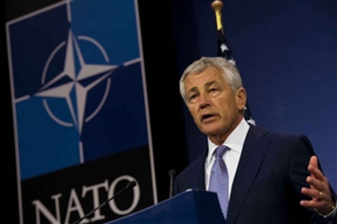 Secretary of Defense Chuck Hagel talks to reporters during a press conference at NATO headquarters in Brussels, Belgium, on June 5, 2013.  Hagel is wrapping up his first NATO defense ministerial conference as secretary.  