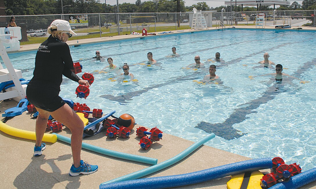 Dr. Mary Wykle teaches Marines and Civilian-Marines the proper techniques of Aquatics Maximum Power-Intense Training during a two-day training the trainer course at the Base Pool, May 21-22. Wykle, who originally developed the program at the request of the Army Surgeon General, has been contracted by the Marine Corps to teach her program.