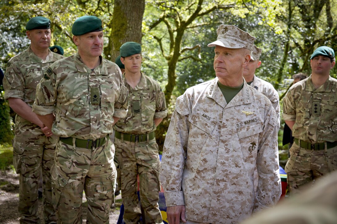 The 35th commandant of the Marine Corps, General James F. Amos, addresses the newest Royal Marines during the Royal Marine Green Baret presentation in Dewerstone Car Park, Plymouth, United Kingdom, on May 22, 2013. (U.S. Marine Corps photo by Sgt. Mallory S. VanderSchans)(RELEASED)
