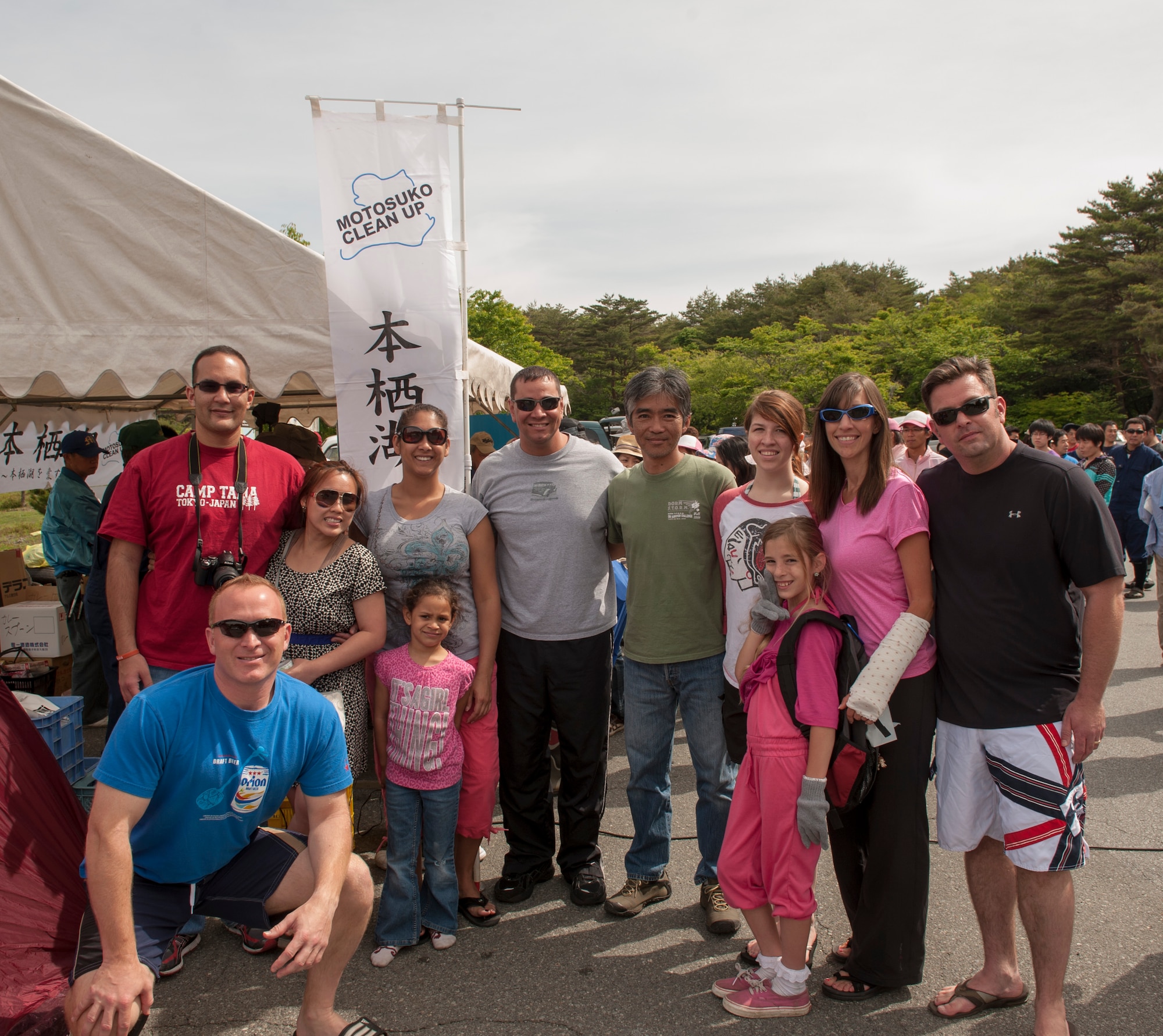 LAKE MOTOSU, Japan -- Yokota Air Base Dive Club members take part in an opening presentation of the Motosuko Cleanup at Lake Motosu, Japan, June 1, 2013. The dive club was reinstated at Yokota May, 2013, and since, the members have volunteered for two lake litter removal dives, one being the Motosuko Cleanup. (U.S. Air Force photo by Senior Airman Michael Washburn)