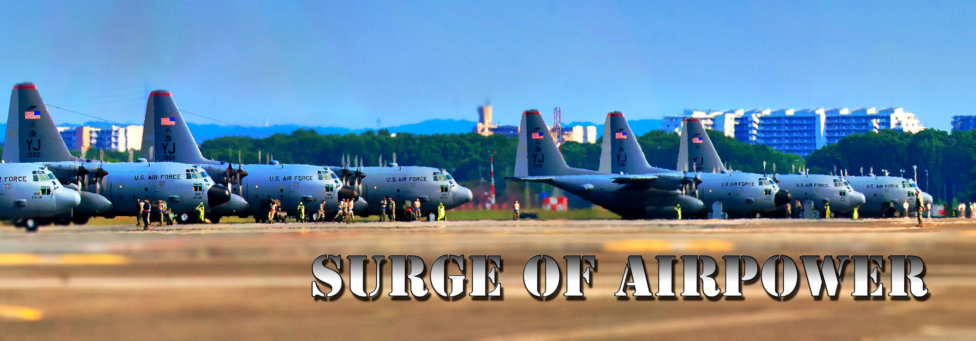 YOKOTA AIR BASE, Japan -- Eight C-130 Hercules aircraft take to the sky and trained on the ability to perform large-force employment and tactics at Yokota Air Base, Japan, June 4, 2013. (U.S. Air Force photo illustration by Osakabe Yasuo) 