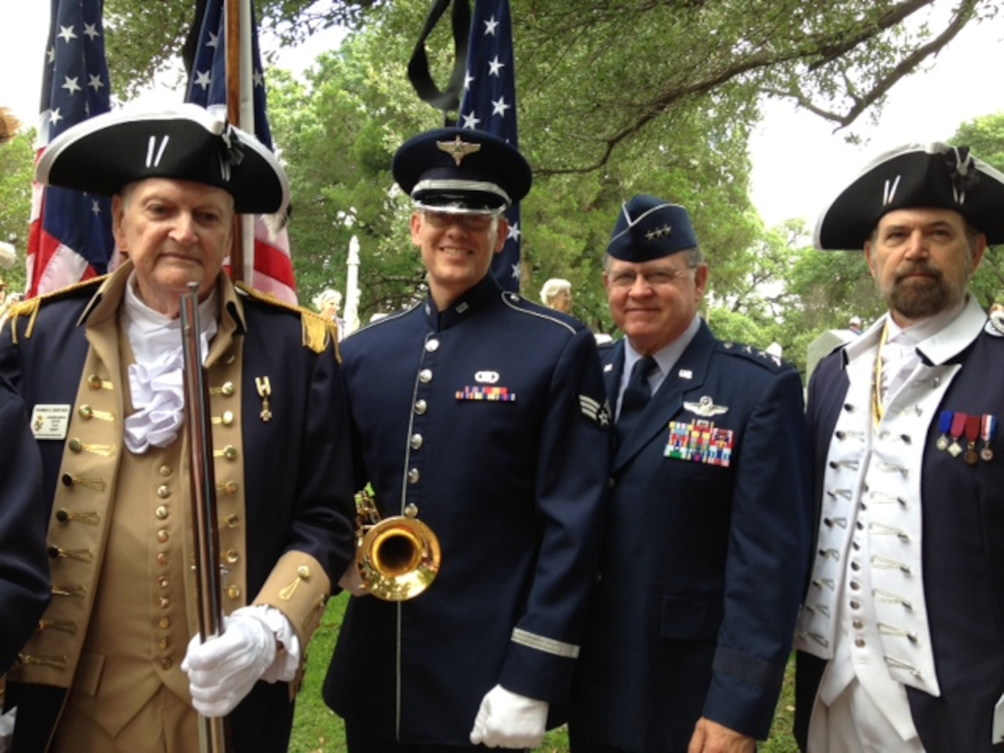 SrA Daniel Thrower performs "Taps" at the Texas State Cemetary in Austin, TX.