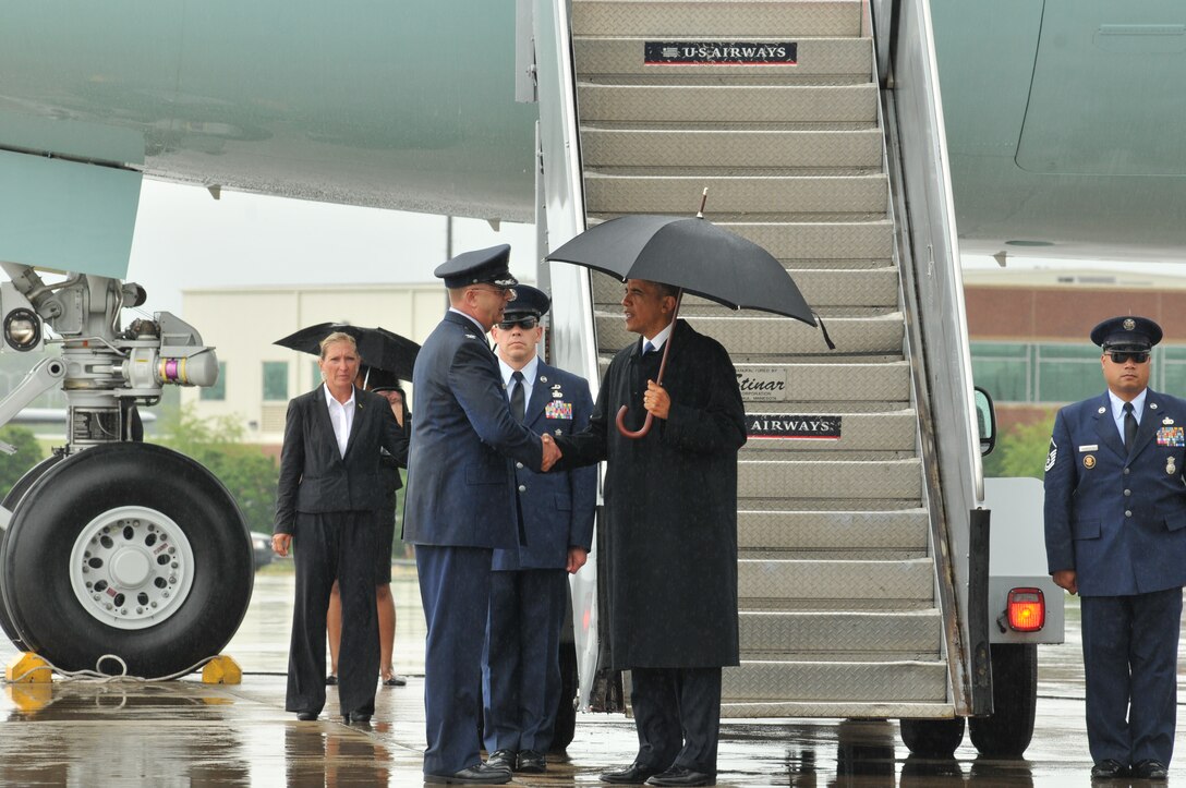 U.S. Air Force Col. Roger E. Williams Jr., 145th Airlift Wing commander greets President Barack Obama as he arrives at the North Carolina Air National Guard base, Charlotte Douglas Intl. Airport Thursday, June 6, 2013.  As part of his "Middle Class Jobs & Opportunity Tour," the President traveled to Mooresville Middle School in Mooresville, N.C., to deliver remarks and see firsthand the school's cutting edge technology and digital learning curriculum. (U.S. Air National Guard photo by Tech. Sgt. Patricia Findley/Released)