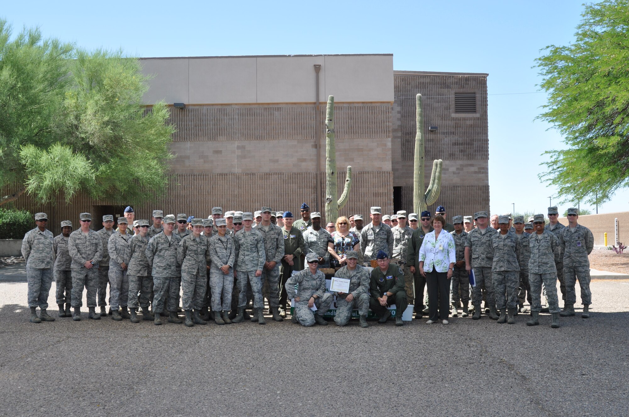 The 612th Air and Space Operations Center was recognized for their contributions to  Tucson’s Adopt-a-Street program, June 6. Since March of 2012, the unit has performed more the 220 hours of regular cleanups. (USAF photo by Master Sgt. Kelly Ogden/Released)