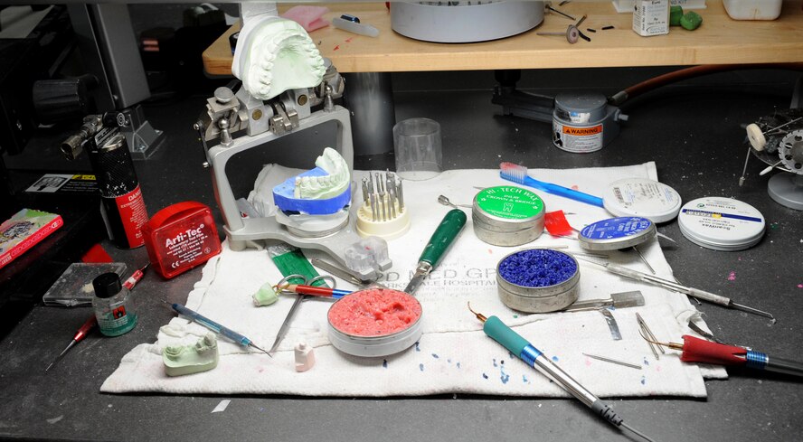 Tools lab technicians from the 2nd Dental Squadron use rest on a table on Barksdale Air Force Base, La., June 6, 2013. The dental laboratory provides assistance to the 2nd DS by providing doctors with the services they need such as fabricating prostheses, creating molds of patient's teeth and providing accurate dental imagery. (U.S. Air Force photo/Airman 1st Class Benjamin Gonsier)