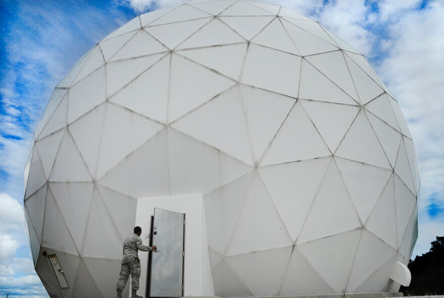 Radio frequencies technician Airmen from the 6th Communications Squadron on MacDill Air Force Base, Fla., maintain the only contiguous U.S. step-side satellite May 30, 2013. The AN/GSC-39 Satellite Communications Terminal has been in use on MacDill since August 1989. (U.S. Air Force photo/Senior Airman Michael Ellis)