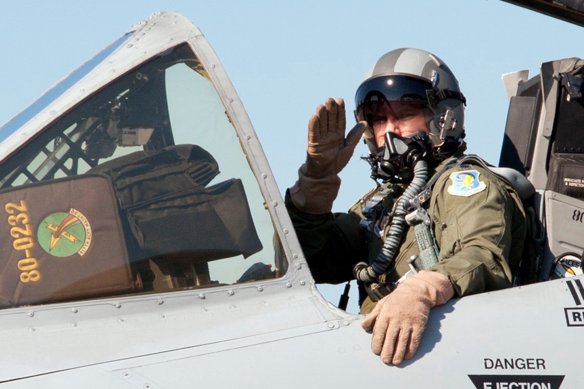 U.S. Air Force Lt. Col. James Gold, pilot, 47th Fighter Squadron, waves farewell to a group of Airmen as he taxis an A-10 Thunderbolt II at Barksdale Air Force Base, La., June 3, 2013. Colonel Gold was piloting one of six A-10s being transferred to Davis-Monthan Air Force Base, Ariz., that day. The transfer of all the A-10s from Barksdale is due to the recent Force Structure Action Implementation Plan that dictates the 917th Fighter Group at Barksdale will be inactivated this year on the last day of September. (U.S. Air Force photo by Master Sgt. Jeff Walston/Released)