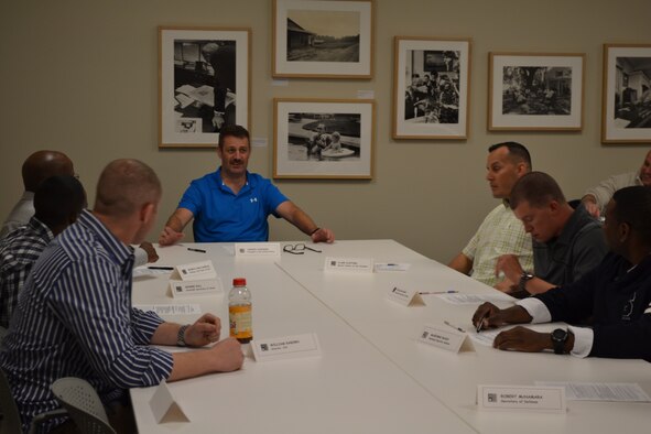 United Kingdom Wing Commander Gus Powell role-playing the part of Lyndon B. Johnson before the descision to enter Vietnam at the Lyndon B. Johnson Presidential Museum in Austin, Texas. The NCOs are members of the cadre from the 343rd Training Squadron. The group learned what pressures this nation's leaders faces before the decision to enter the Vietnam conflict.(U.S. Air Force Courtesy Photo)