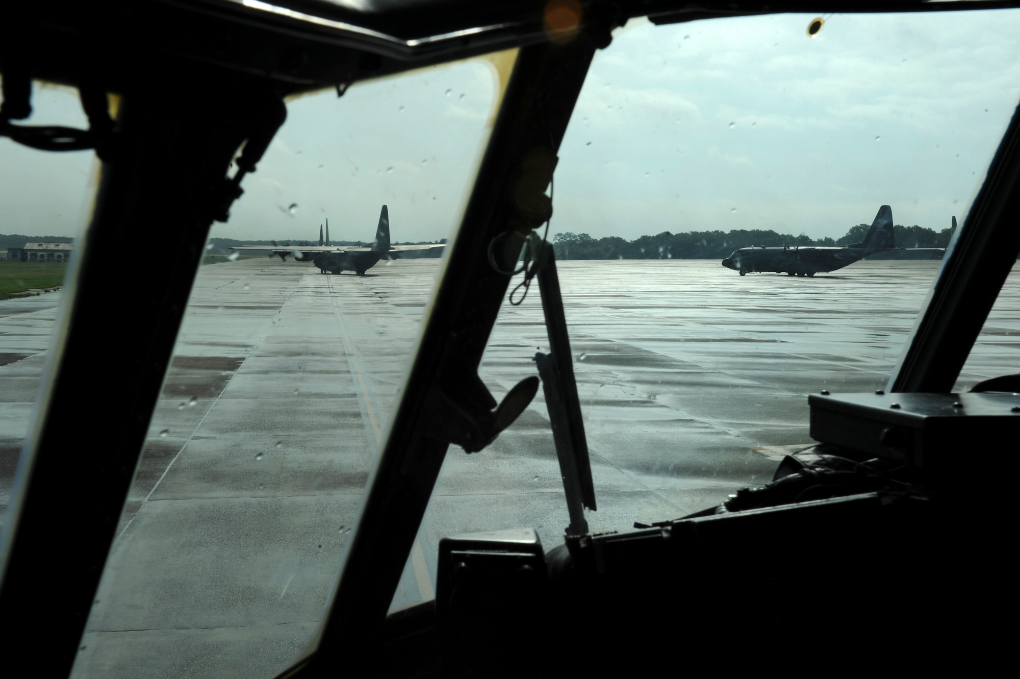 C-130's taxi on the base flightline in preparation for Operation Joint Forcible Entry May 31, 2013, at Little Rock Air Force Base, Ark. More than six C-130's from Little Rock AFB participated in the joint force exercise with the U.S. Army 82nd Airborne Division's 3rd Brigade Combat Team out of Fort Bragg, N.C. (U.S. Air Force photo by Senior Airman Rusty Frank)