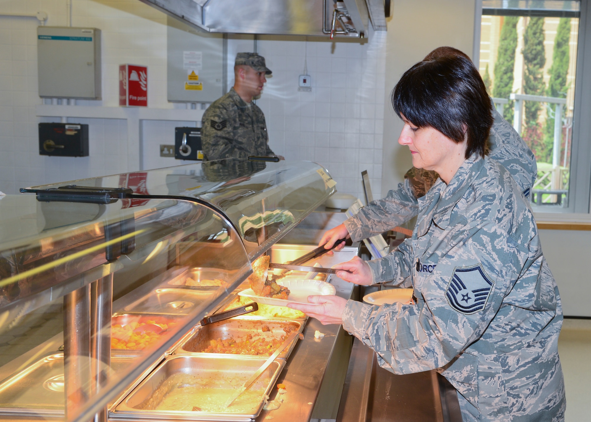 ROYAL AIR FORCE LAKENHEATH, England – Master Sgt. Jene Quinn, 48th Medical Operation Squadron physical therapy flight chief, utilizes the Garden Spot self-serve cafeteria May 15, 2013.  The Garden Spot offers healthy meals that are prepared following the “Go for Green” program guidelines. (U.S. Air Force photo by Staff Sgt. Stephanie Mancha)