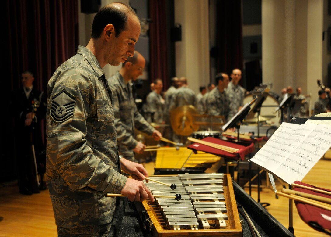 Master Sgt. Marc Dinitz, The United States Air Force Concert Band principal percussionist, performs for members of The Air Force Association during their visit to the 11th Operations Group April 10, 2013. The AFA is a non-profit aerospace education association who toured the 11th OG in order to gain a better understanding of the group’s internal and overall mission. (U.S. Air Force photo/Senior Airman Lindsey A. Porter)