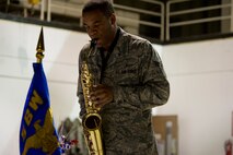 MINOT AIR FORCE BASE, N.D. – Senior Airman Keith DeBose, 5th Medical Operations Squadron medical standards technician, plays the National Anthem on his saxophone during the 5th Maintenance Operations Squadron inactivation ceremony, May 31. The inactivation of the squadron is part of a Headquarters Air Force effort to make available additional officer positions from the ranks of junior and mid-grade level Majors. The Air Force Chief of Staff approved the inactivation of all MOS Air Force-wide, except in Intercontinental Ballistic Missile Wings. (U.S. Air Force photos/Senior Airman Brittany Y. Auld)