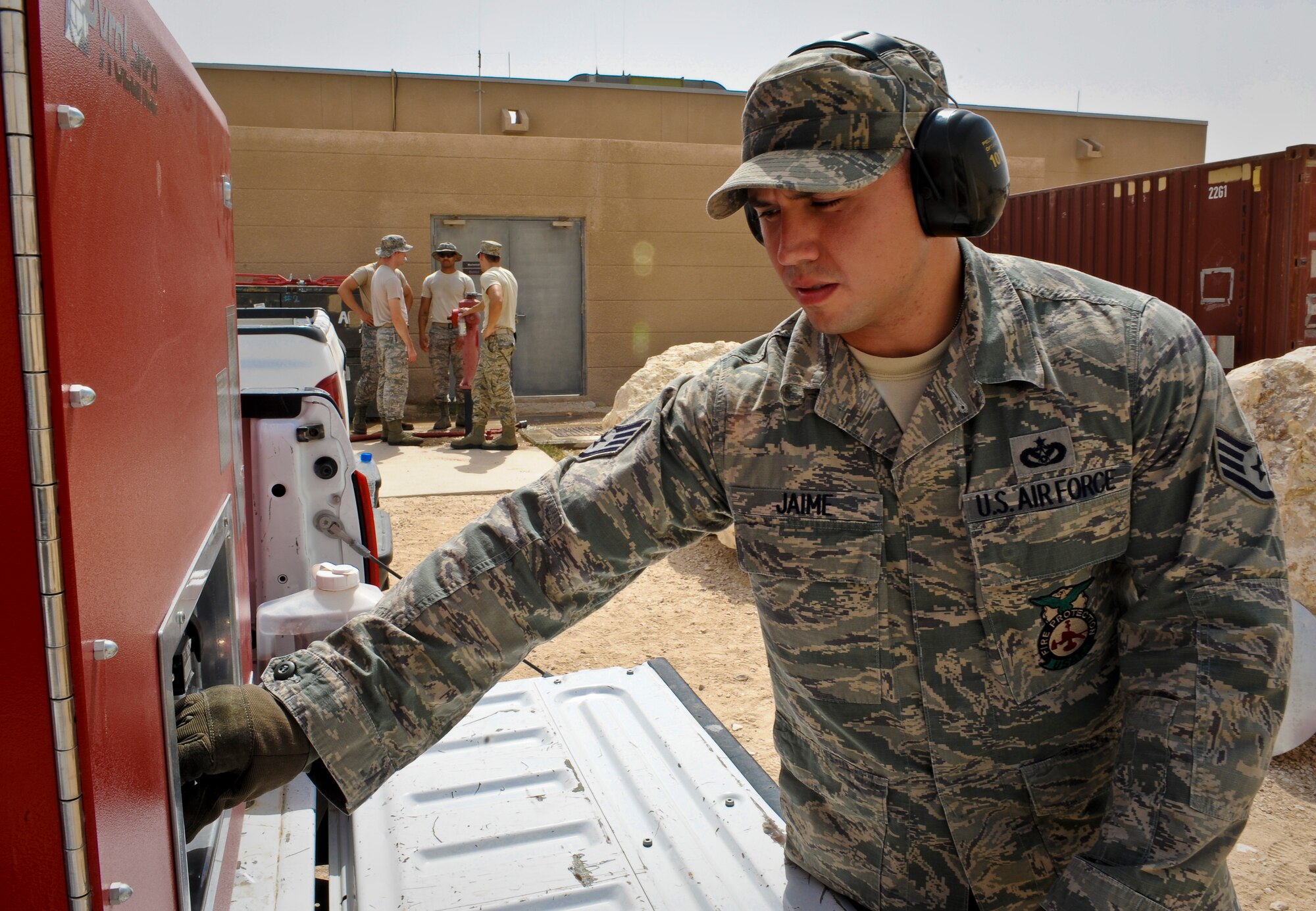 Staff Sgt. Kristopher Jaime operates the water tank and pump generator during training on the PyroLance, June 4, 2013, at the 379th Air Expeditionary Wing in Southwest Asia. This tool gives crews access to engine bays, cabins, cargo holds or anywhere else fire breaks out. Jaime is a 379th Expeditionary Civil Engineer Squadron firefighter. (U.S. Air Force photo/Senior Airman Benjamin Stratton)