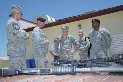 U.S. Air Force Brig. Gen. Robert D. LaBrutta, 502nd Air Base Wing and Joint Base San Antonio commander, tours the Combat Arms Range June 5, at JBSA-Randolph. LaBrutta will visit the three primary JBSA locations this week.  He took command during a ceremony May 29. (U.S. Air Force photo by Joel Martinez/Released) 
