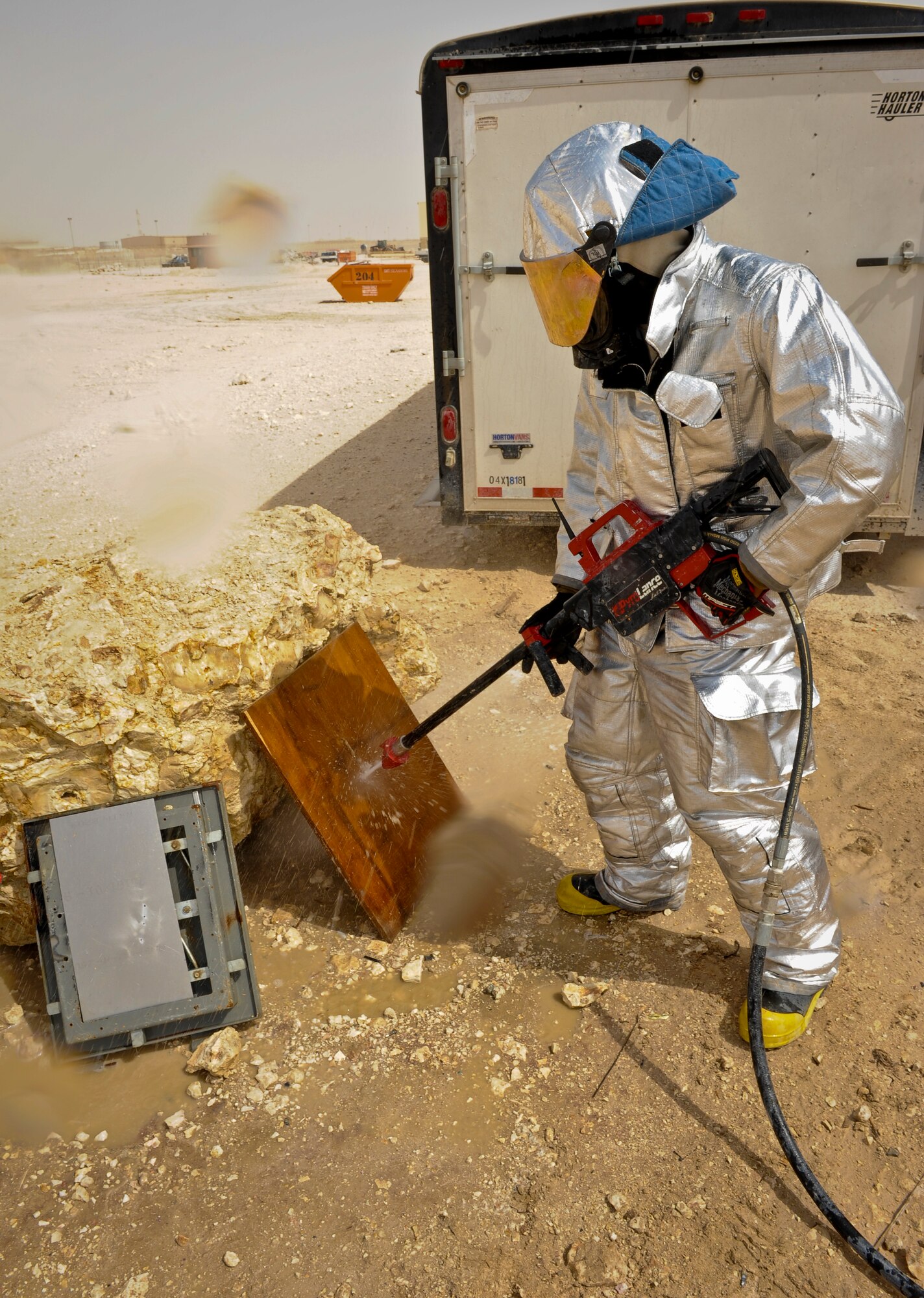 Airman 1st Class Taner Masters practices using a PyroLance during training, June 4, 2013, at the 379th Air Expeditionary Wing in Southwest Asia. This tool gives crews access to engine bays, cabins, cargo holds or anywhere else fire breaks out. Masters is a 379th Expeditionary Civil Engineer Squadron firefighter. (U.S. Air Force photo/Senior Airman Benjamin Stratton)