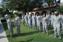 U.S. Air Force Brig. Gen. Robert D. LaBrutta, Joint Base San Antonio and 502nd Air Base Wing commander, greets the 902nd Security Forces Squadron June 5, at JBSA-Randolph.  LaBrutta will visit the three primary JBSA locations this week.  He took command during a ceremony May 29. (U.S. Air Force photo by Joel Martinez/Released)