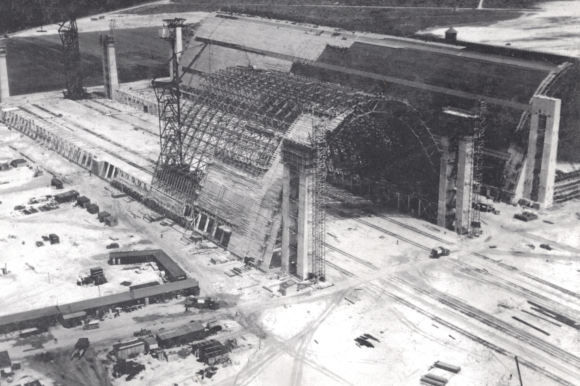 Hangars 5 and 6 under construction in 1943. The hangars each contain 241,000 square feet of floor space and were originally designed to house the Navy’s expanding fleet of antisubmarine patrol blimps of the World War II era. (U.S. Navy courtesy photo/Released)