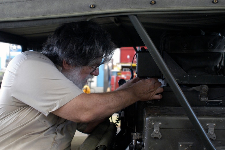 DAYTON, Ohio (06/2013) -- Volunteer Larry Youngblood tries out a fabricated part on the M151 Jeep. (U.S. Air Force photo)