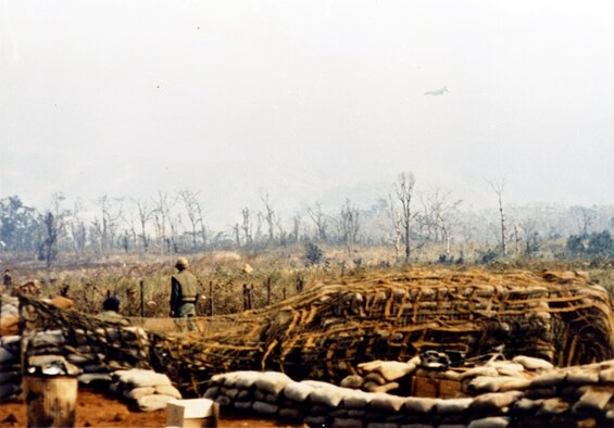 Besieged U.S. Marines at Khe Sanh, Vietnam, watch as a U.S. Air Force F-4 makes close air support strike over the area. (U.S. Air Force photo)