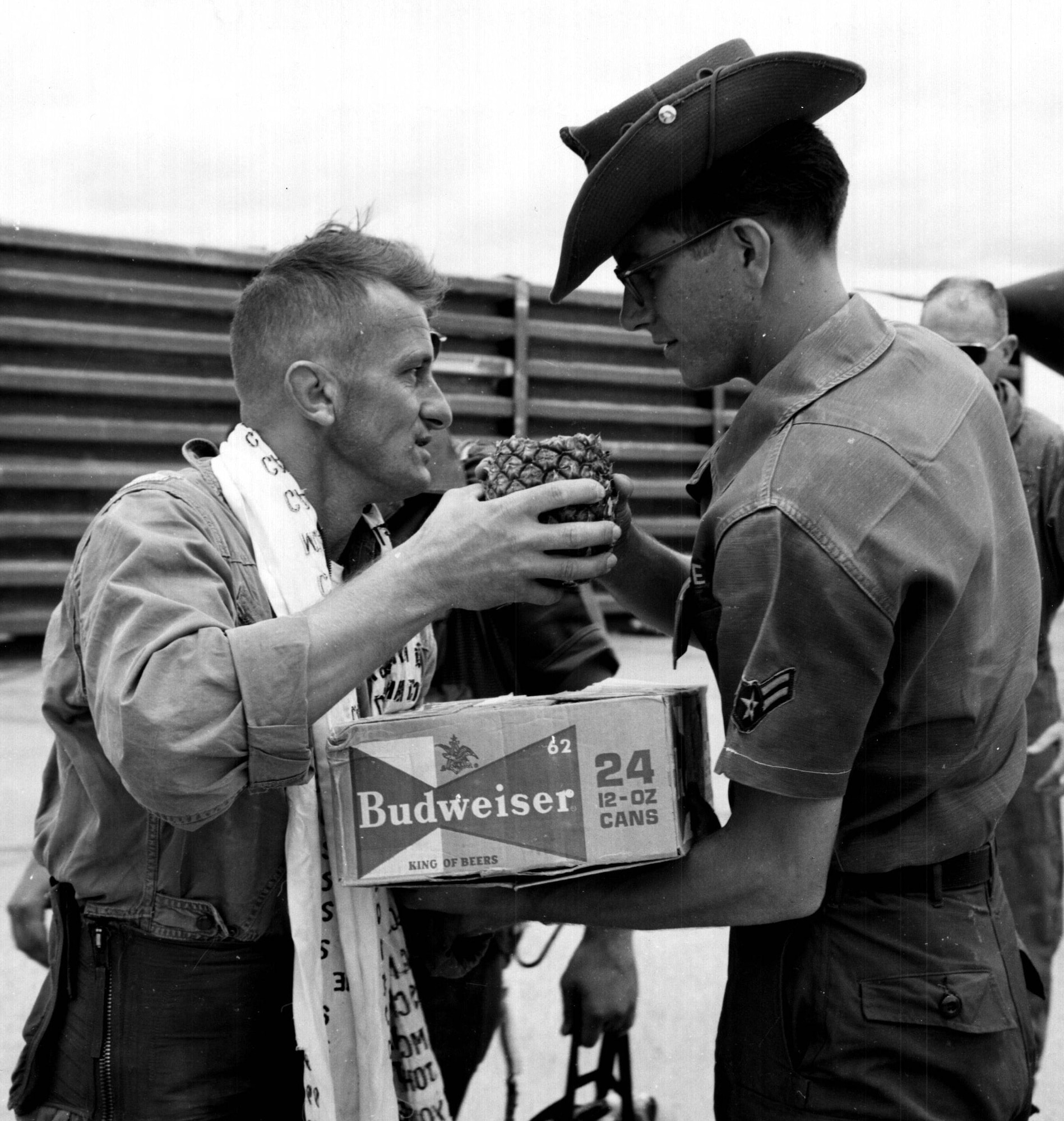 Retired U.S. Air Force Lt. Col. Harry Pawlik accepts gifts after his final flight at Korat Air Base, Thailand in Aug. 1967. Pawlik commissioned into the Air Force as a fighter pilot in 1955 and retired in 1980. He flew seven different aircraft at 12 different Air Force bases. (Courtesy Photo)