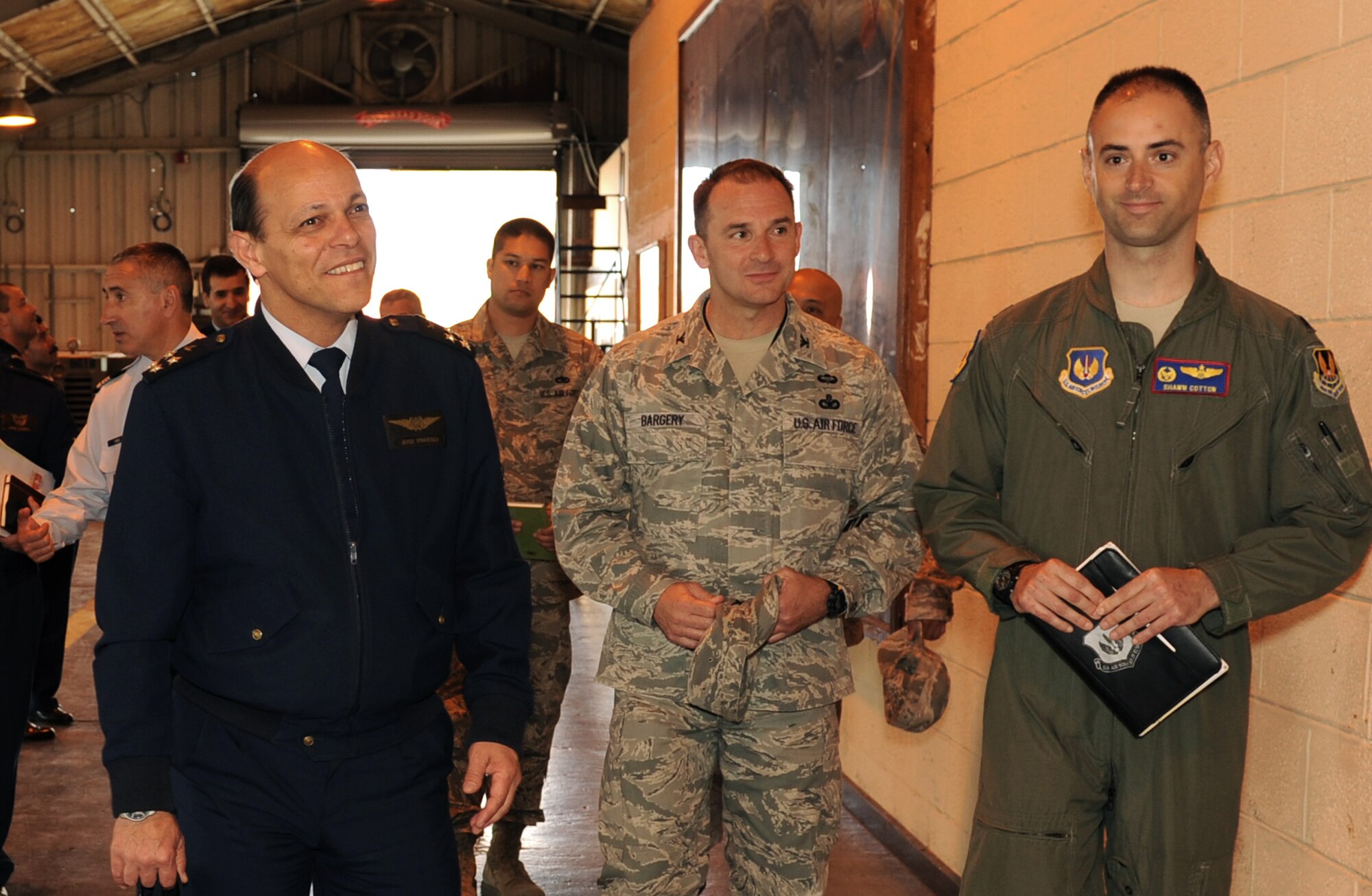 Gen. Jose Antonio Magalhaes Araujo Pinheiro, Portuguese Air Force Chief of Staff, takes a tour through a 65th Operations Support Squadron facility with Col. Chris Bargery, 65th ABW commander and Lt. Col. Shawn Cotton, 65th OSS commander, during his visit to the 65th ABW, June 4, 2013.   Gen. Araujo Pinheiro stopped at Lajes Field for the 72nd Anniversary of Portuguese Air Base 4.  (Photo by Guido Melo/released)