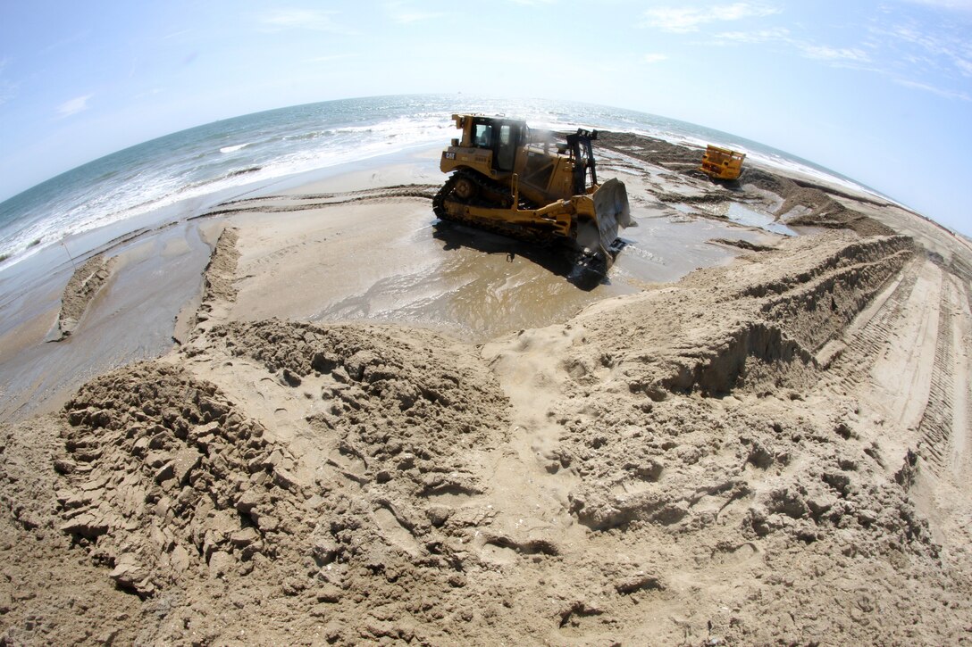 SANDBRIDGE, Va. -- The Norfolk District, U.S. Army Corps of Engineers, partnering with the city of Virginia Beach, Va., began a five-mile hurricane protection and beach renourishment project in Sandbridge in mid-April, 2013. The $13.35 million non-federal project included the dredging and placement of approximately 2 million cubic yards of sand along public beachfront from Back Bay National Wildlife Refuge to the Dam Neck Naval facility. 