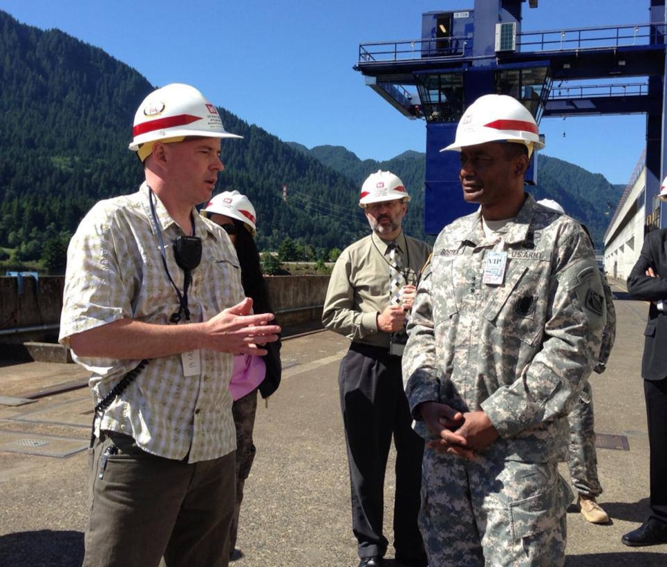 Portland District fisheries biologist Ben Hausmann discusses fish passage at Bonneville Lock and Dam with Chief of Engineers Lt. Gen. Thomas Bostick during his June 4 visit.
