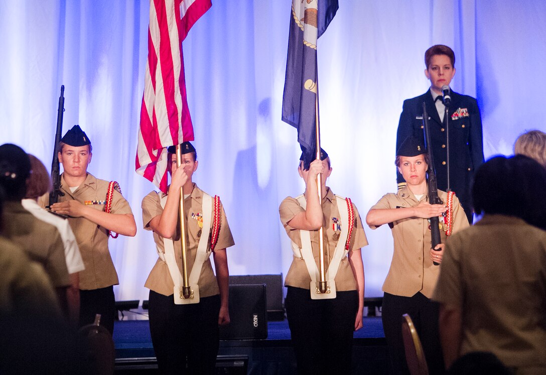 Loudoun County High School Navy Junior ROTC color guard members present the colors during opening ceremonies of the 2013 Joint Women's Leadership Symposium in National Harbor, Md., June 6, 2013. 
